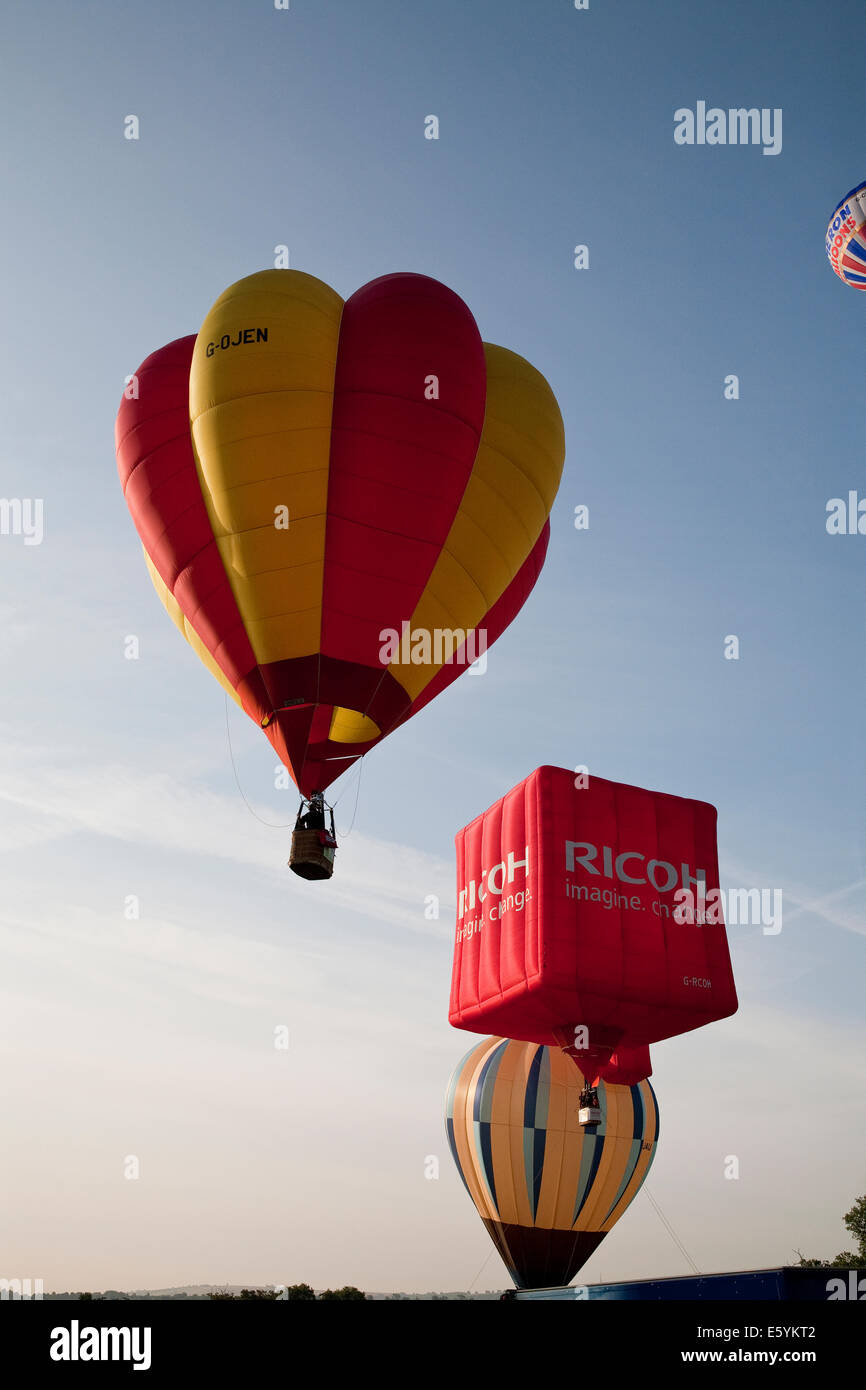 Bristol, UK. 8th August, 2014. Colourful Balloons lift off during the Bristol International Balloon Fiesta Credit: Keith Larby/Alamy Live News Stock Photo