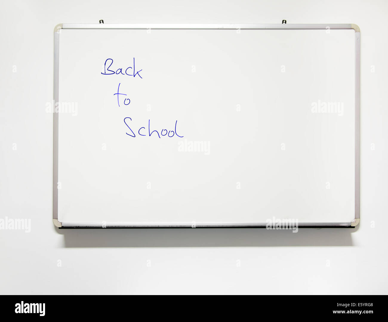 Back to school on real whiteboard. With real shadow etc. Stock Photo