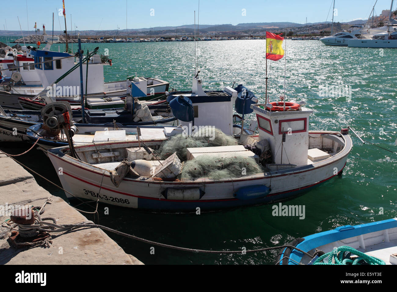 Small Spanish fishing boats in Estepona harbour Stock Photo Alamy