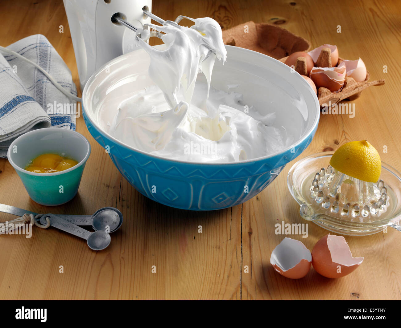 Step by step mixing to stiff peaks meringues Stock Photo