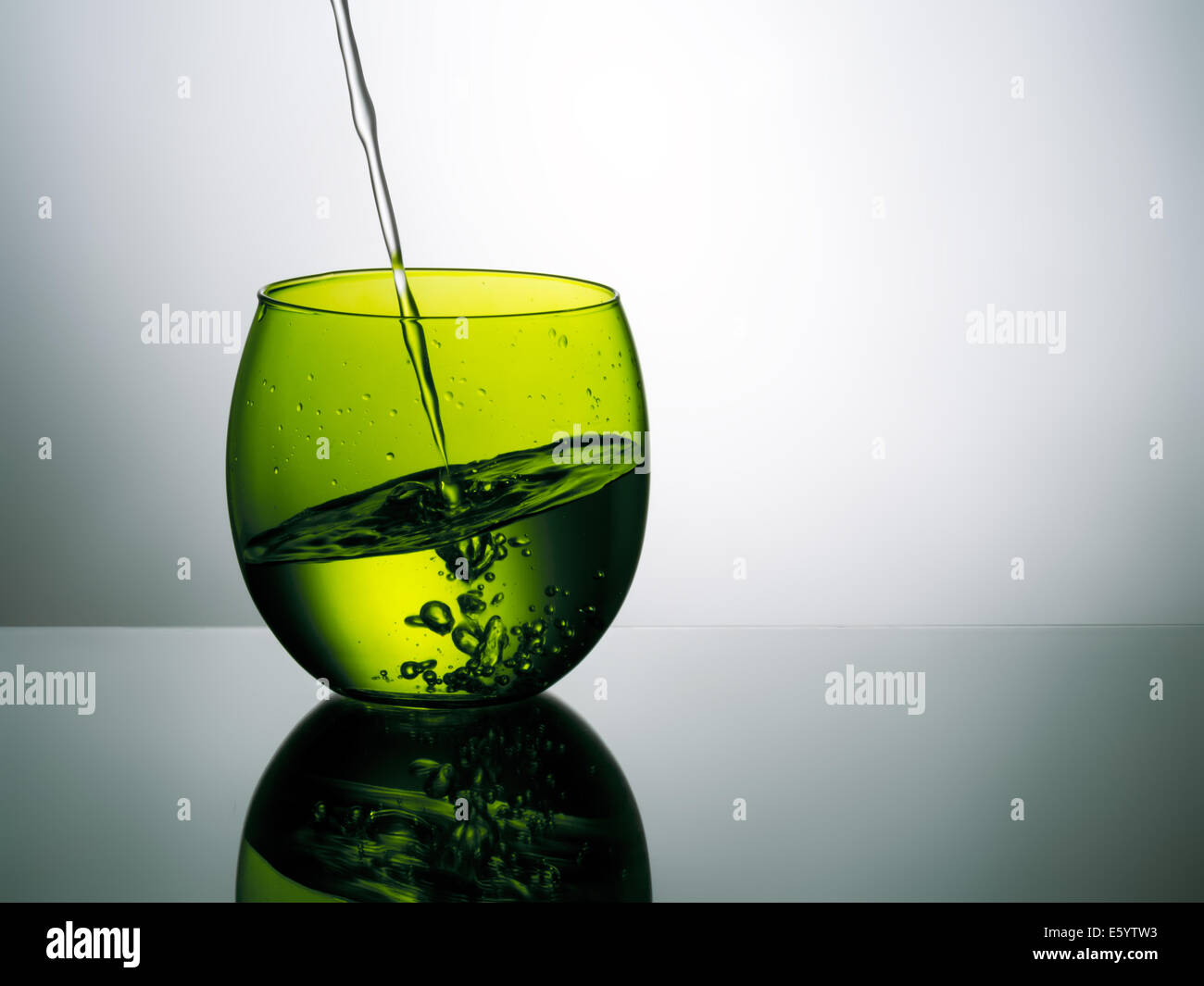 Strange angle water in glass - point of view concept. Stock Photo