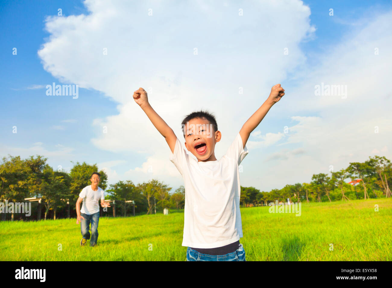 Father happy children in park hi-res stock photography and images - Alamy