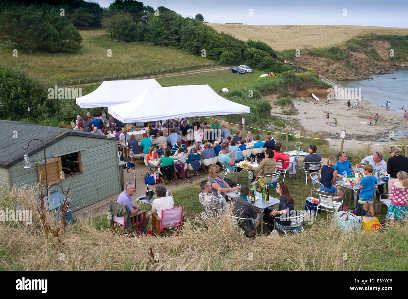 Hidden Hut,Portcurnick Beach,Cornwall, UK,a beachside cafe and restaurant,which hosts'feast nights',here it's curry night.a UK Stock Photo