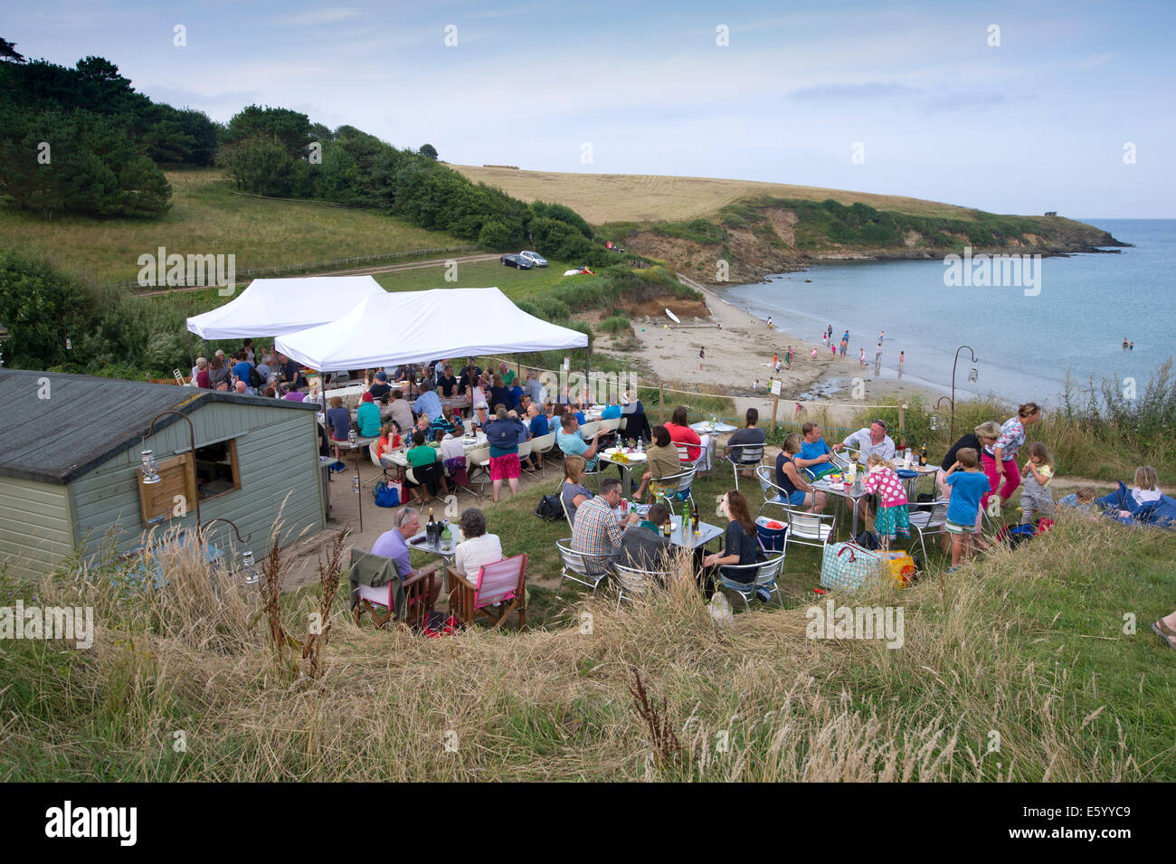 Hidden Hut,Portcurnick Beach,Cornwall, UK,a beachside cafe and restaurant,which hosts'feast nights',here it's curry night.a UK Stock Photo