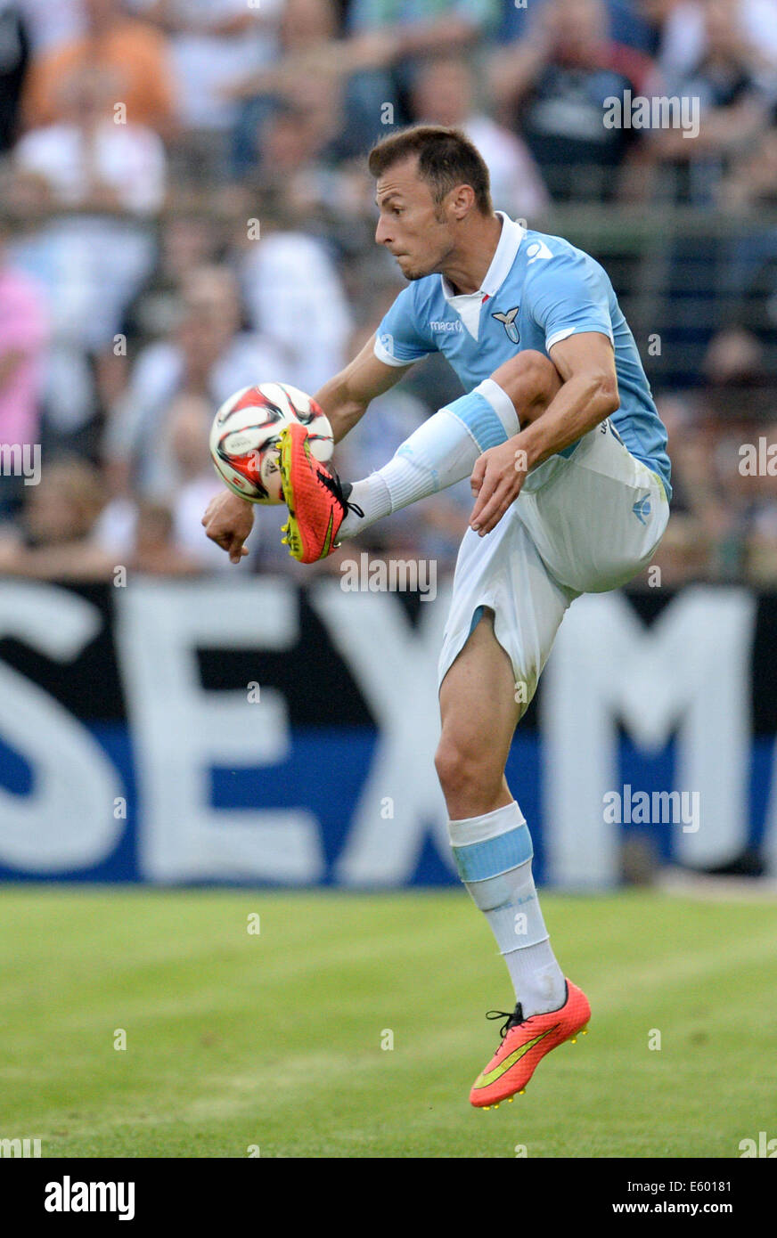 Luebeck, Germany. 08th Aug, 2014. Rome's Stefan Radu in action during ...