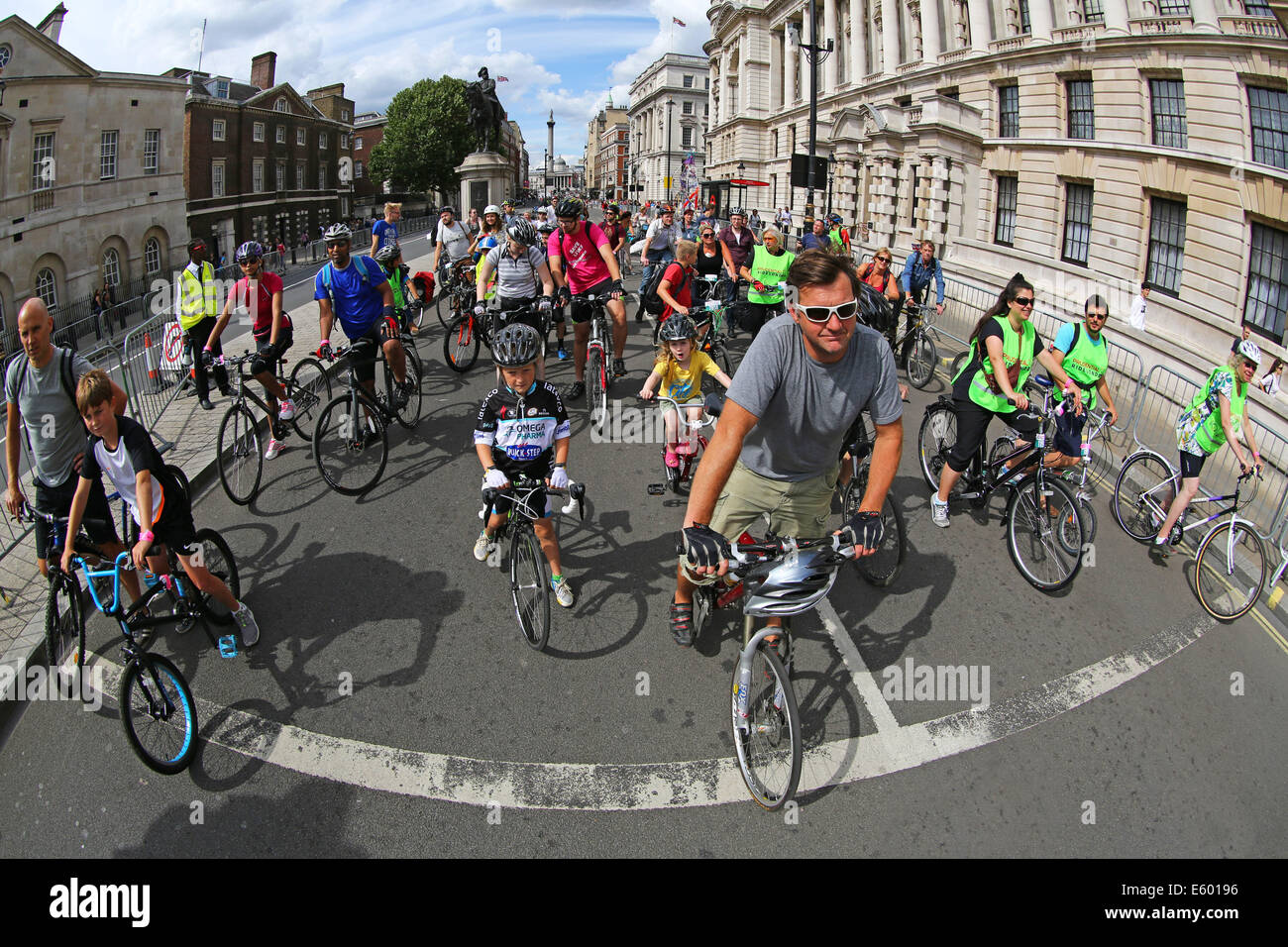 London, UK. 9th August 2014. Some of the 24,000 cyclists who took part in the Ride London 2014 cycling on bicycles through central London Credit:  Paul Brown/Alamy Live News Stock Photo
