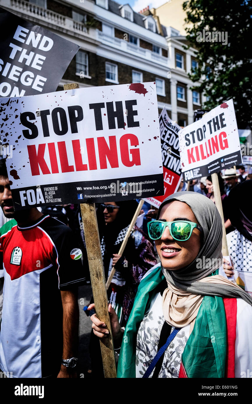 Portland Place, London, 9th August 2014.  Placards demanding an end to the violence in Gaza being held aloft at a protest in London.  Photographer;  Gordon Scammell/Alamy Live News Stock Photo