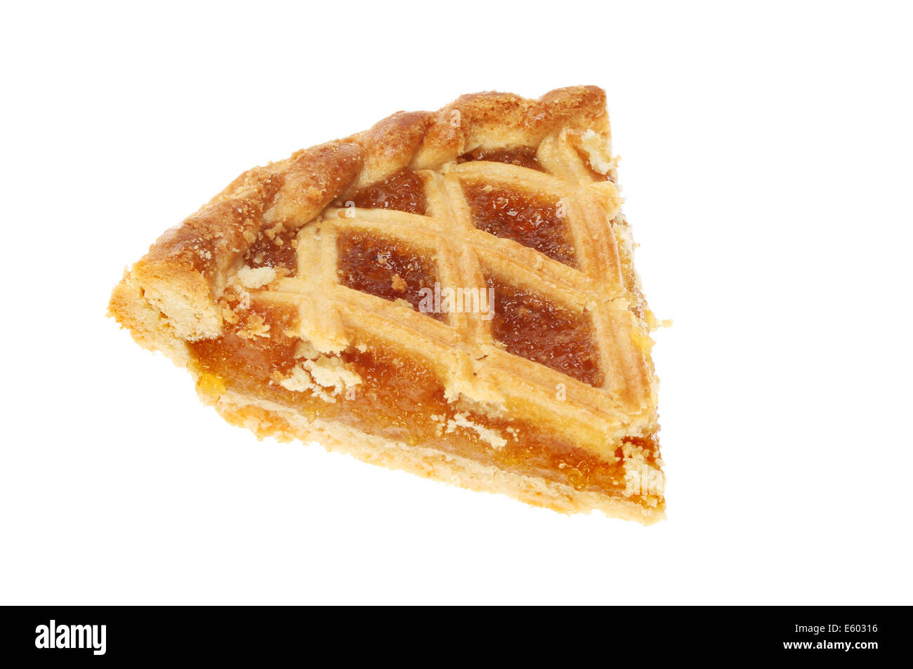 Slice of treacle tart isolated against white Stock Photo