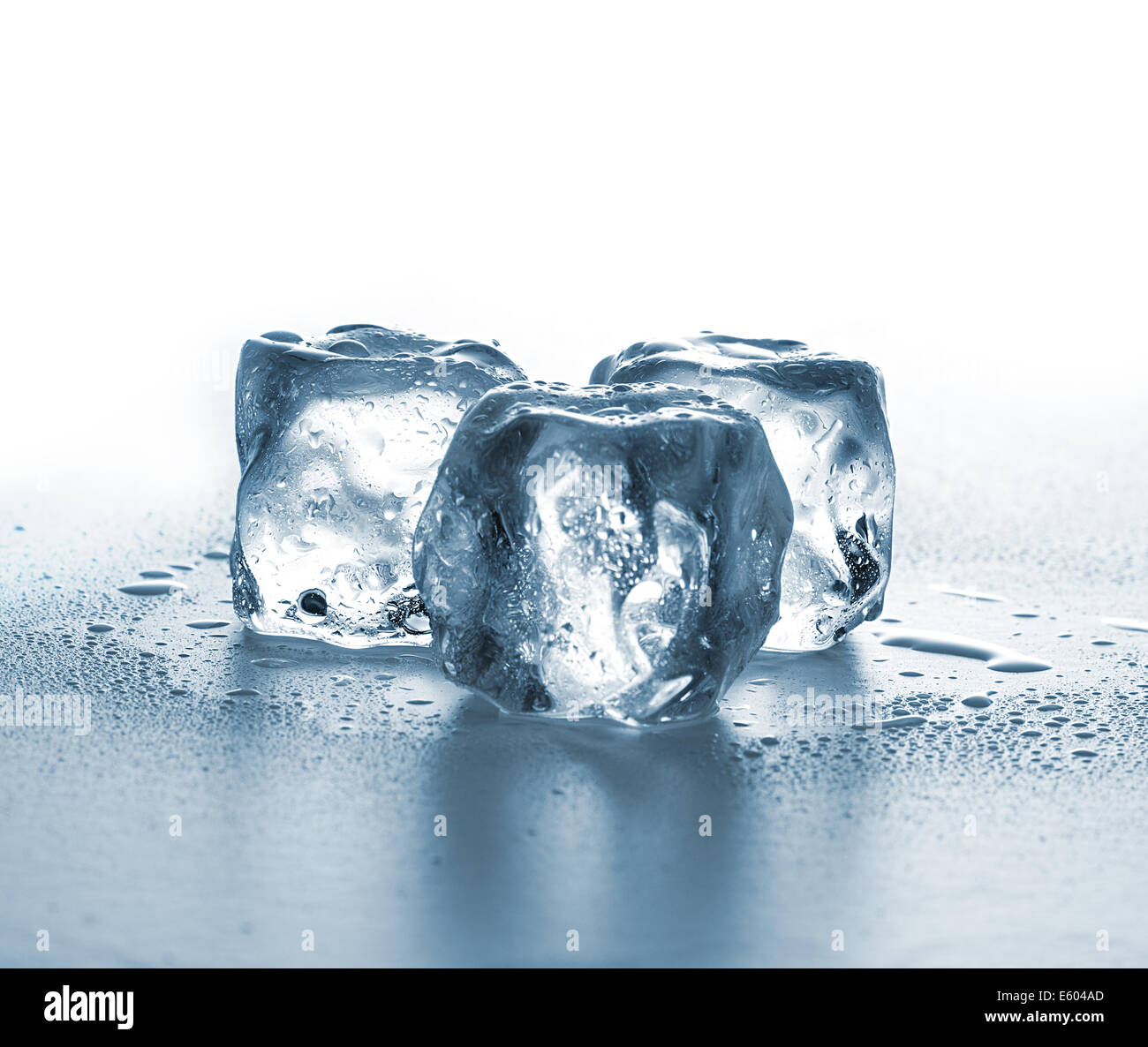 ice cubes on white background Stock Photo - Alamy