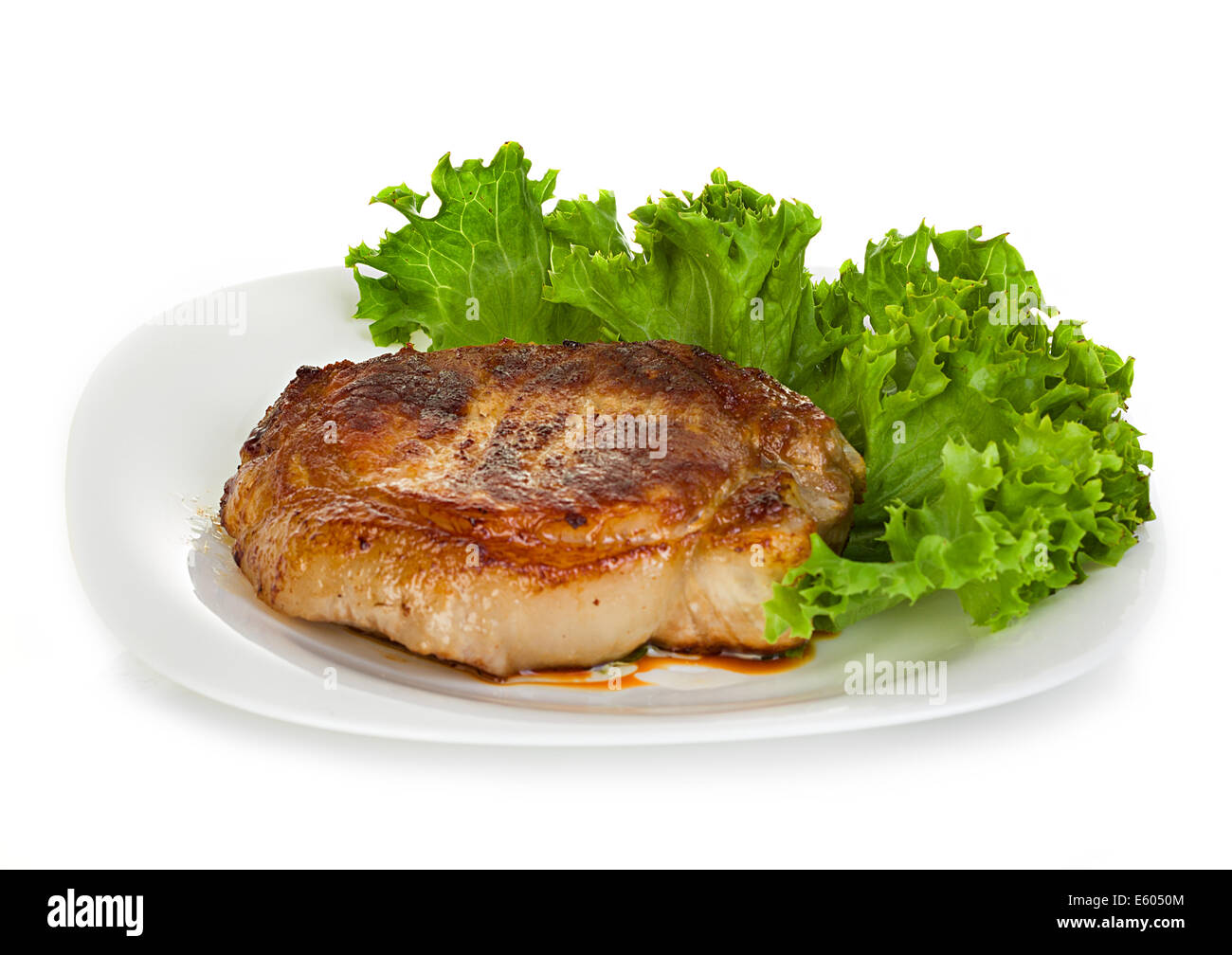 meat steak with lettuce isolated on white background Stock Photo