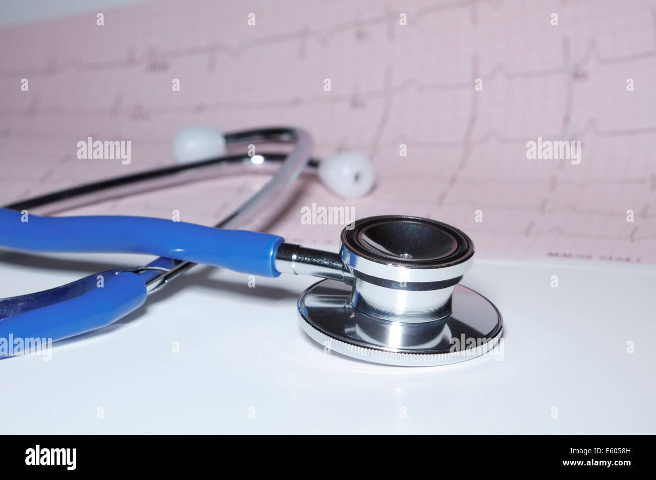 Electrocardiogram Acoustic stethoscope and electrocardiogram printout. Stock Photo