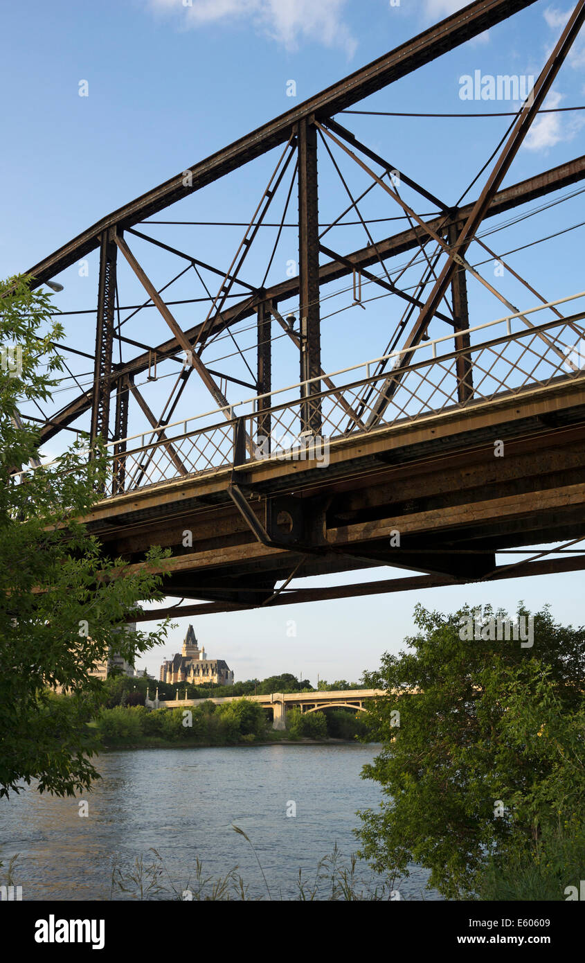 Old truss bridge across the South Saskatchewan River, built in 1907, and closed in 2010. Stock Photo