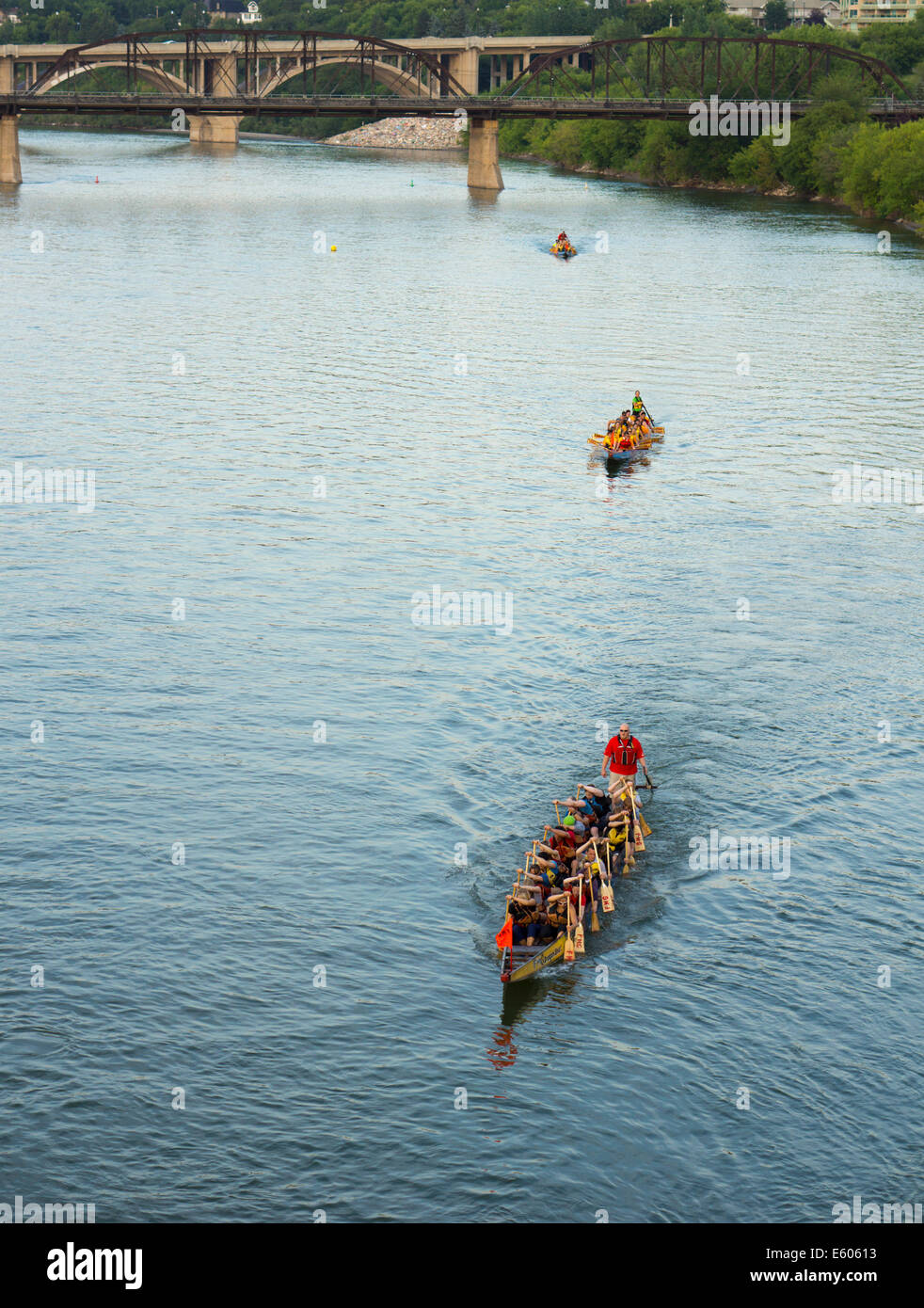 Dragon Boat team practice on the South Saskatchewan River in Saskatoon Stock Photo
