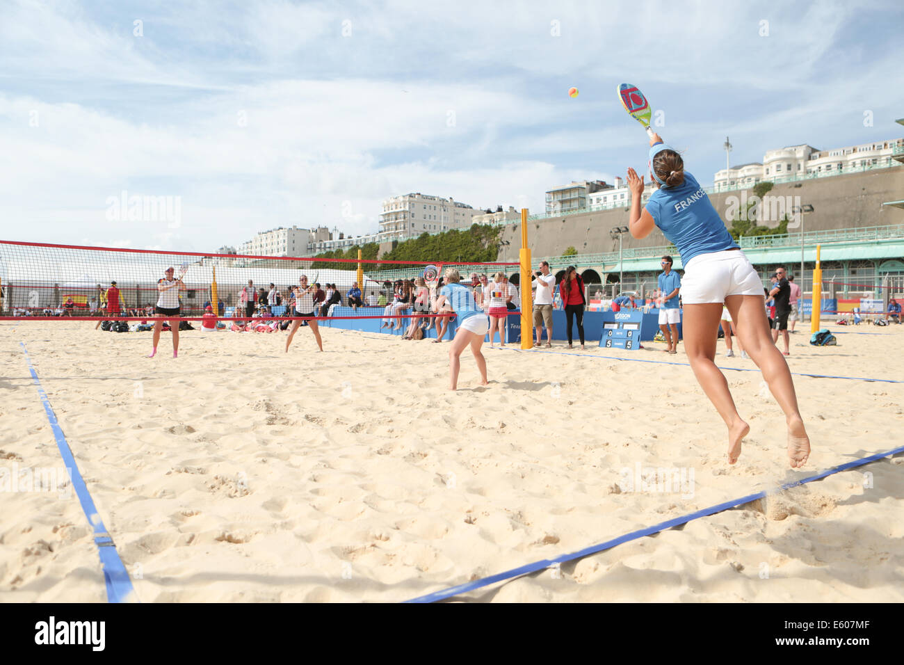 City of Brighton & Hove, East Sussex, UK. European Beach Tennis Championships 2014 Brighton, Yellow Wave, Madeira Drive, Brighton, Sussex, UK. In this image is a women's doubles quarter final between teams from France and Germany. 9th August 2014David Smith/Alamy Live News Stock Photo