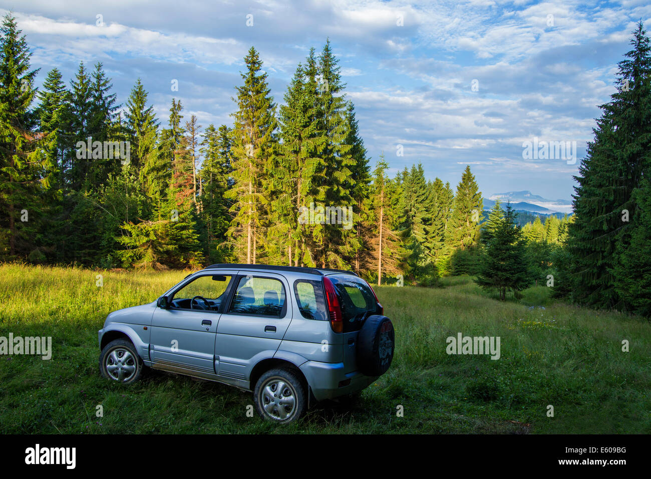 Summer landscape with 4x4 car in Apuseni Mountains-Romania Stock Photo