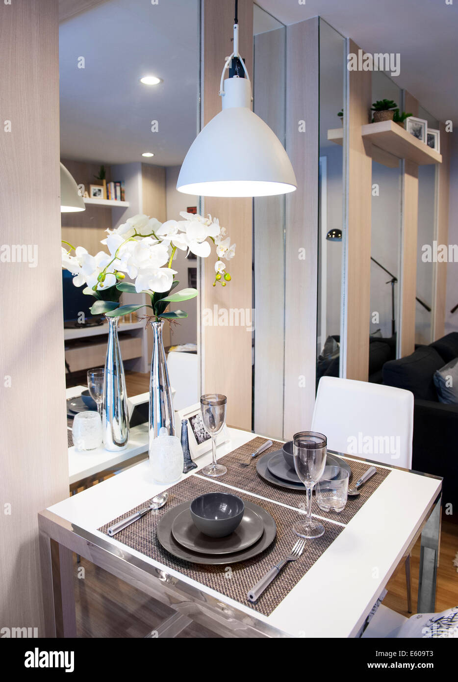 Modern dining table Stock Photo - Alamy