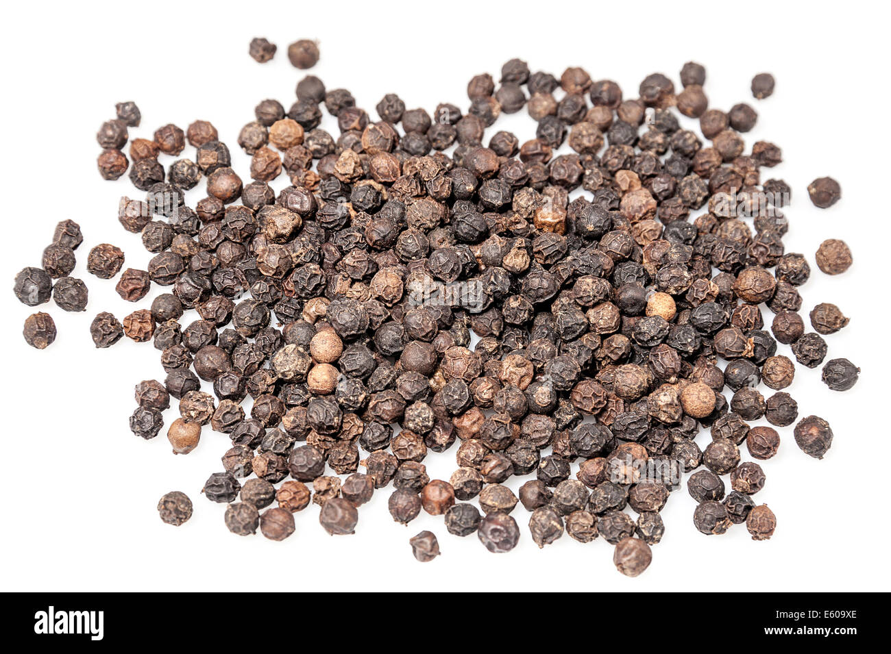 Black pepper seeds pile on white background Stock Photo Alamy