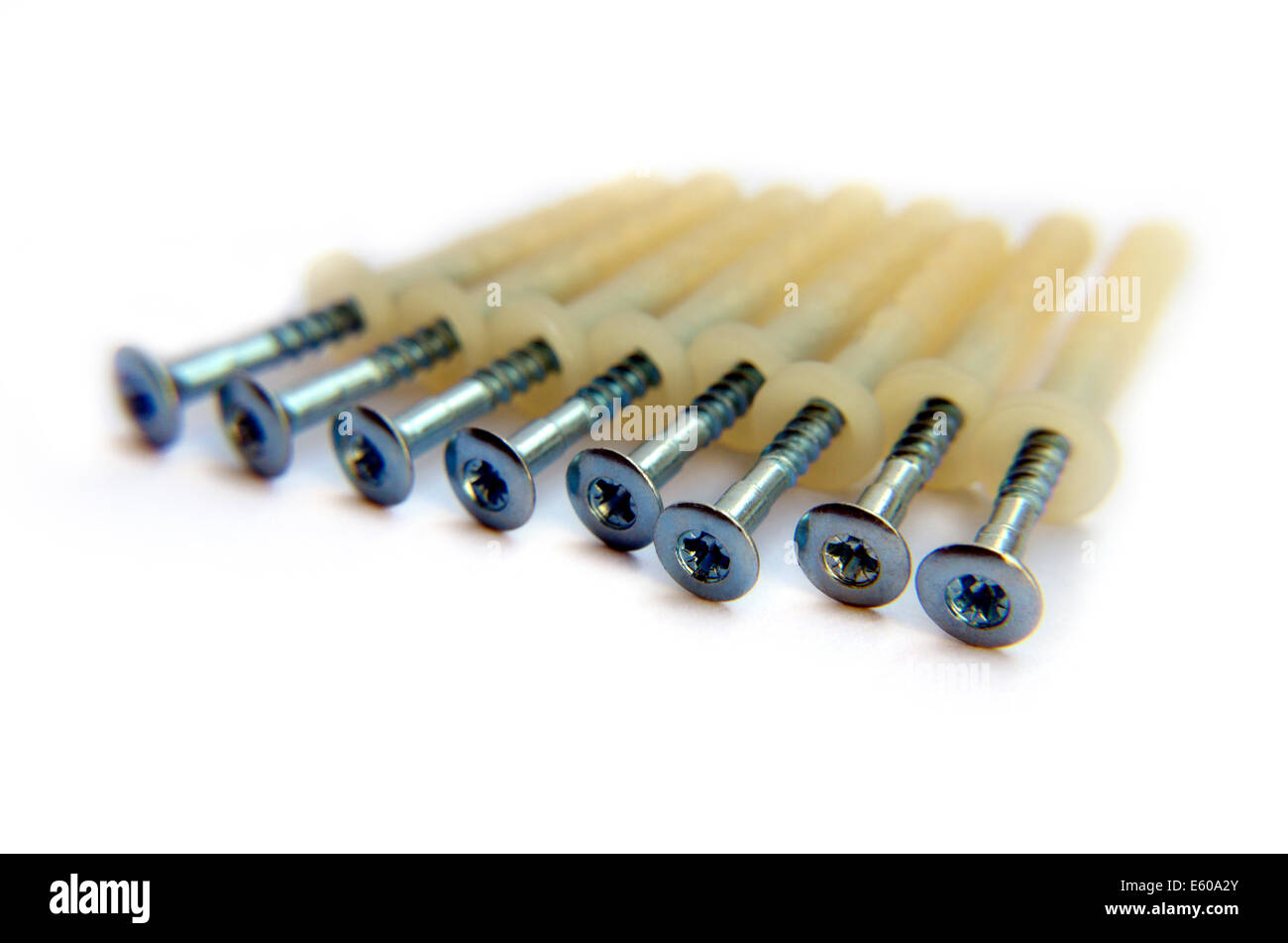 Plastic Dowels With Screws Isolated On White Background Stock Photo