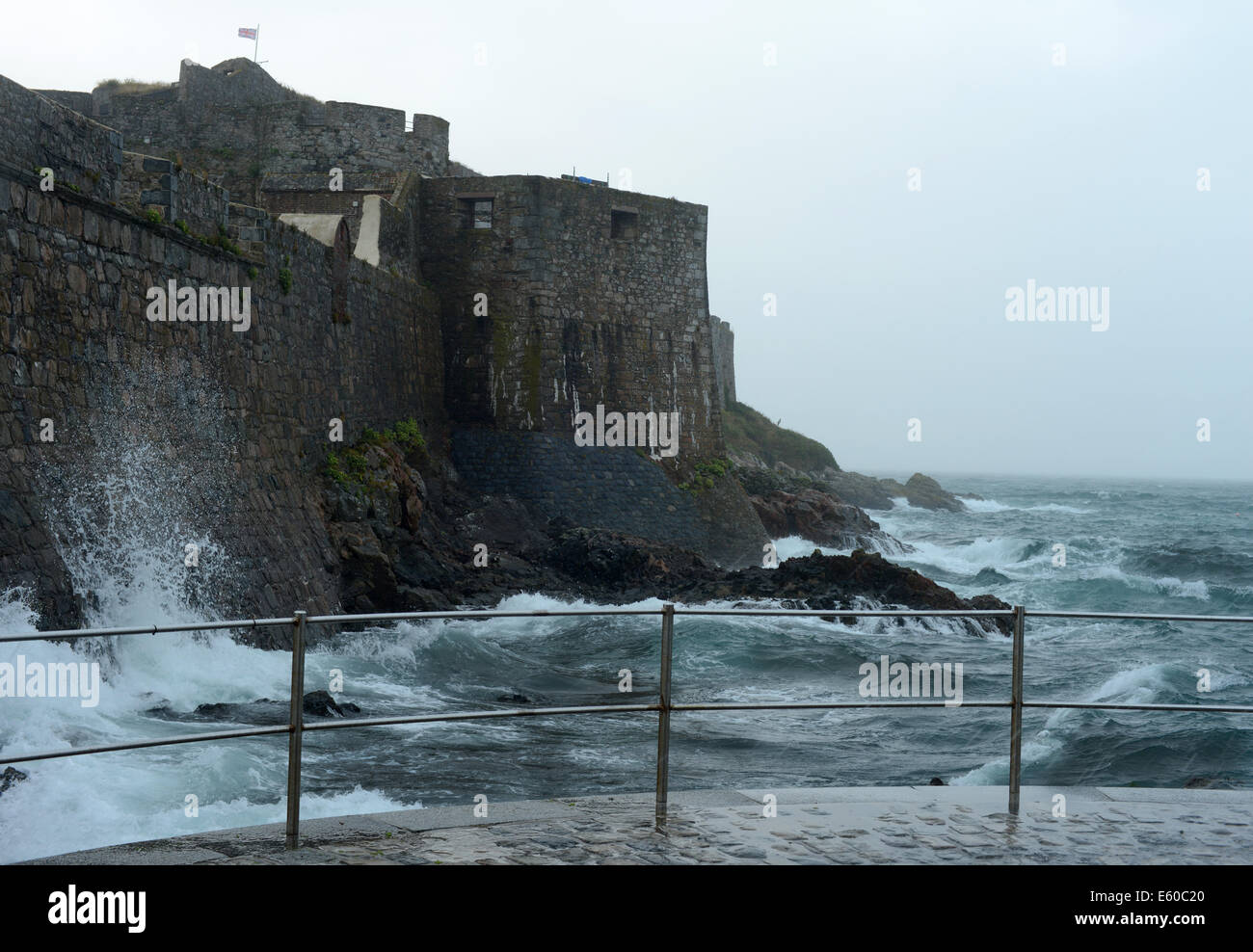 St Peter Port, Guernsey, Channel Islands. 10th August 2014. Castle Cornet in St Peter Port, Guernsey is battered by ex Hurricane Bertha as it passes over Guernsey bringing strong winds and heavy rain. It is expected to pass relatively quickly and head North eastwards towards Scotland and the North East. © Robert Smith Stock Photo