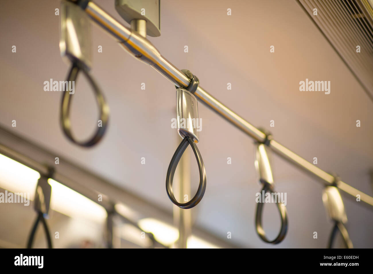 Subway train handle Stock Photo - Alamy