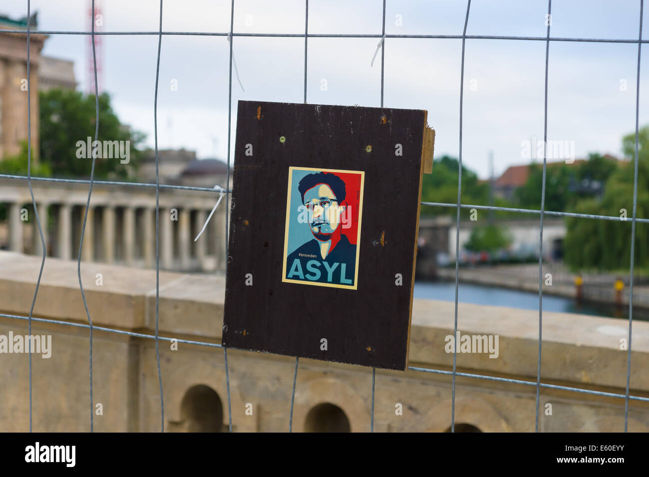 BERLIN, GERMANY - JUNE 06, 2014: Stylized portrait of Edward Snowden on the fence. Former officer of the CIA and NSA. Stock Photo