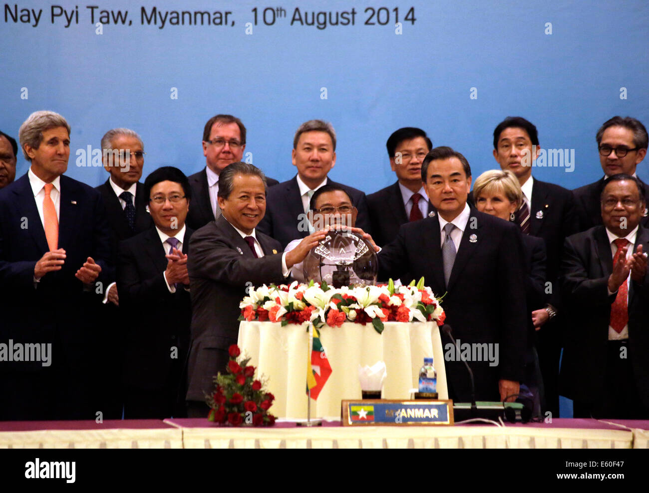 Nay Pyi Taw, Myanmar. 10th Aug, 2014. Chinese Foreign Minister Wang Yi (R front) and other delegates attend the launching ceremony of the logo of the ASEAN Regional Forum Disaster Relief Exercises 2015 (ARF DiREx 2015) on the sidelines of the 21st ASEAN Regional Forum (ARF) Retreat Session at Myanmar International Convention Center (MICC) in Nay Pyi Taw, Myanmar, Aug. 10, 2014. © U Aung/Xinhua/Alamy Live News Stock Photo