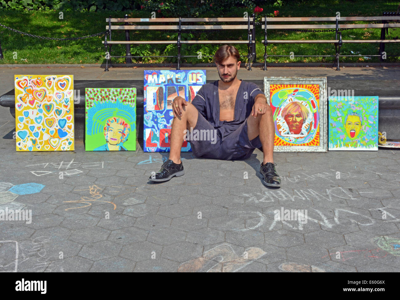 Portrait of an artist who sells his paintings mostly to tourists, in Washington Square Park in Greenwich Village, New York City. Stock Photo