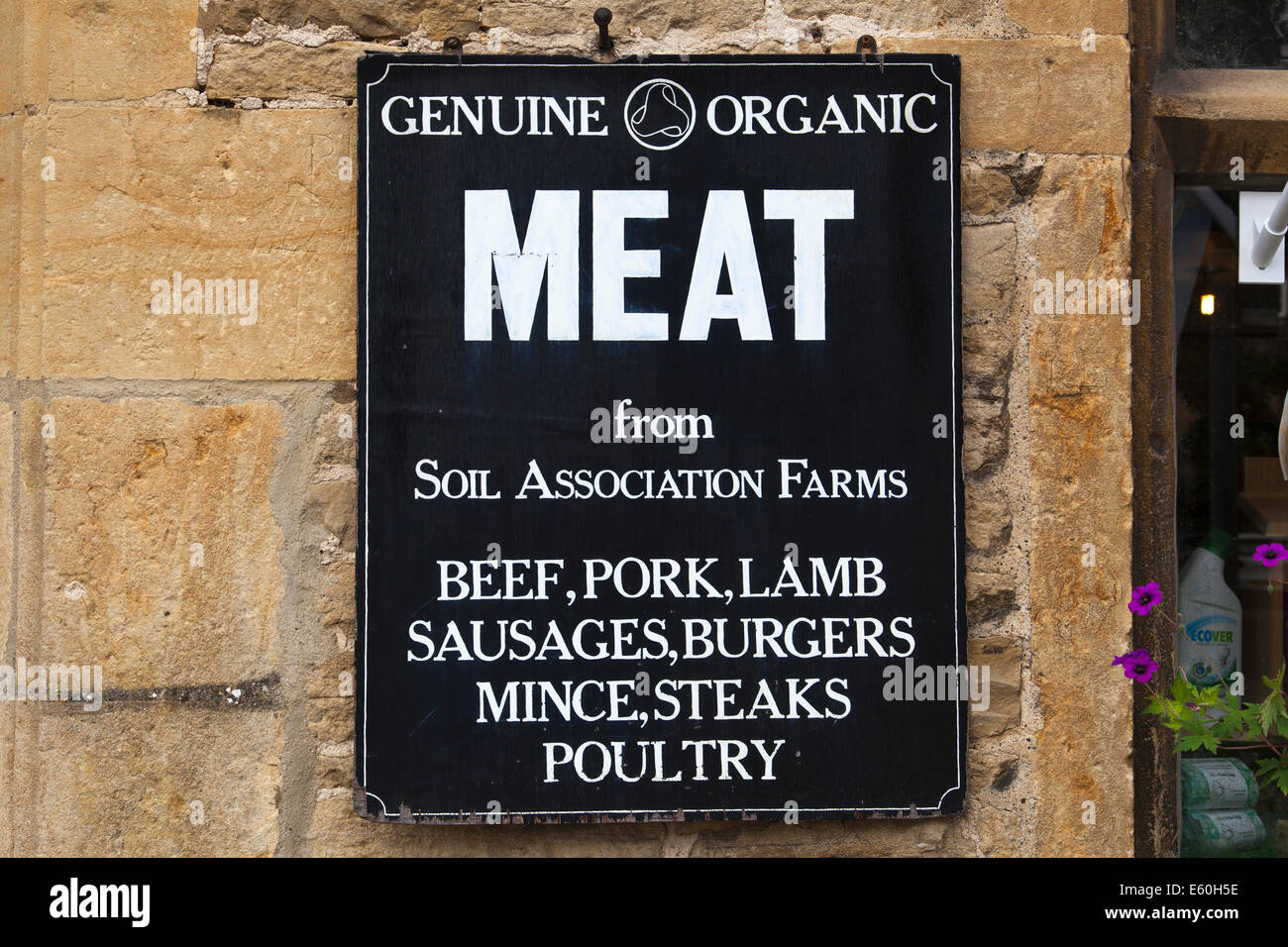Organic meat & poultry for sale at a butcher's shop in the U.K. Stock Photo