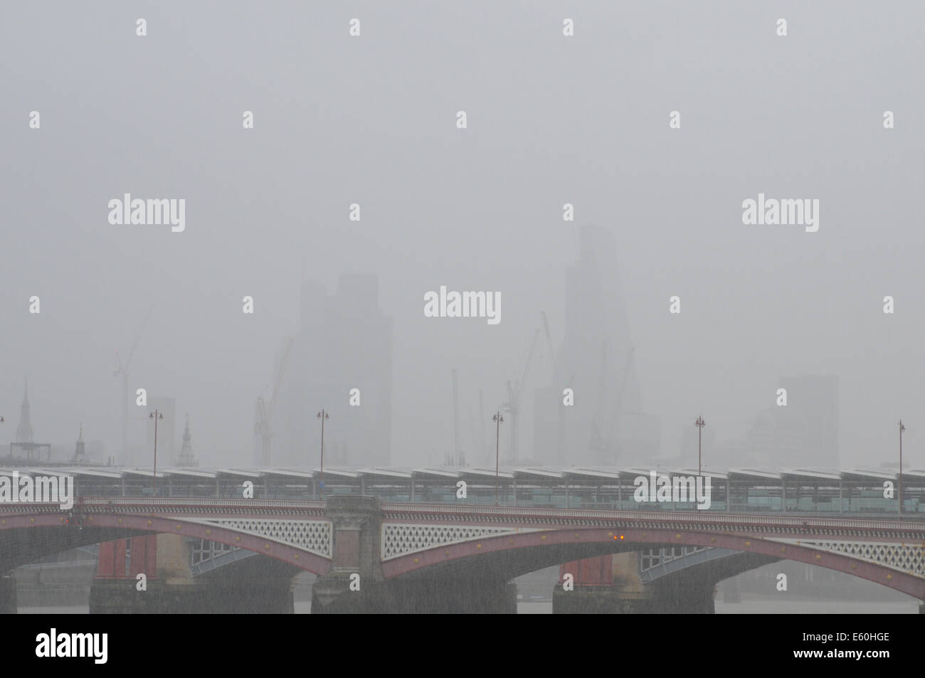 London, UK, 10th August 2014. Hurricane Bertha brings heavy rain and wind to London after weeks of warm sunny weather. Credit:  JOHNNY ARMSTEAD/Alamy Live News Stock Photo