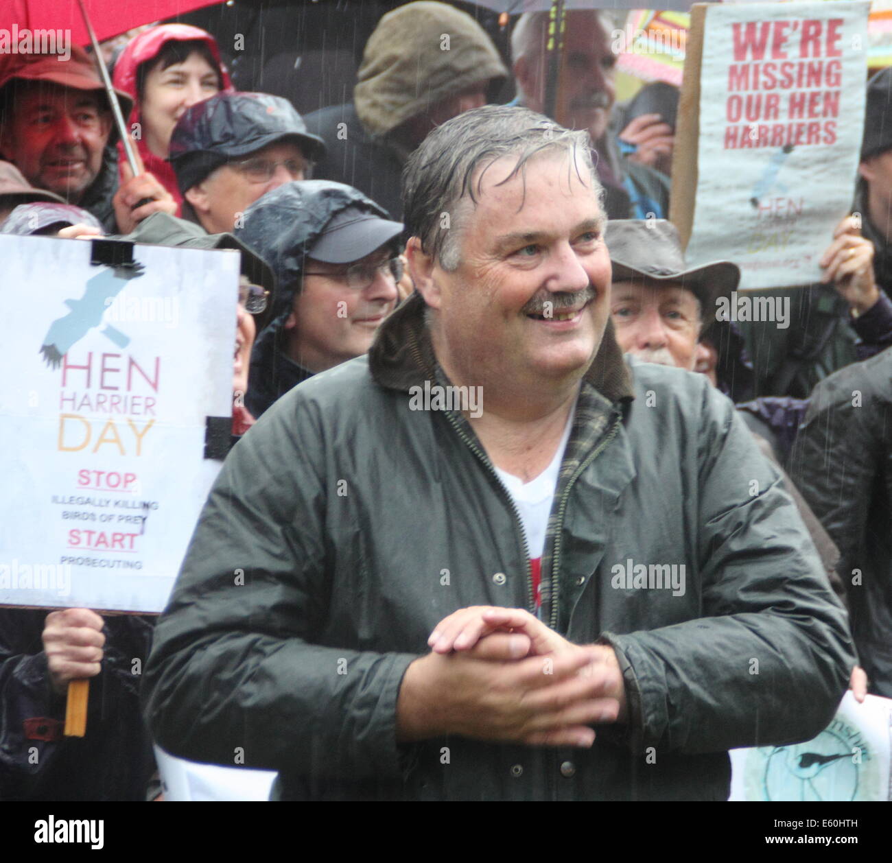 Peak District, Derbyshire, UK.  10th August, 2014.  Two days before grouse shooting season opens, protesters led by former RSPB Conservation Director, Mark Avery (pictured) and BBC presenter, Chris Packham  gather by Derwent Dam, Upper Derwent Valley to express their opposition to the killing of hen harriers. According to the RSPB, Northern England’s uplands should have 320 pairs of breeding hen harriers but no chicks were raised in England in 2013. Credit:  Deborah Vernon/Alamy Live News Stock Photo