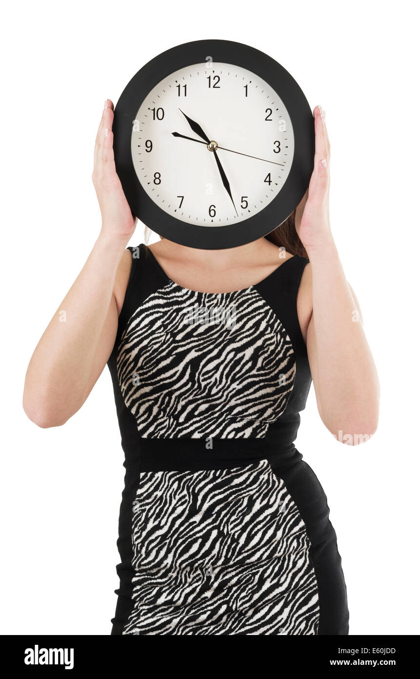 Beautiful young woman holding big round clock Stock Photo - Alamy