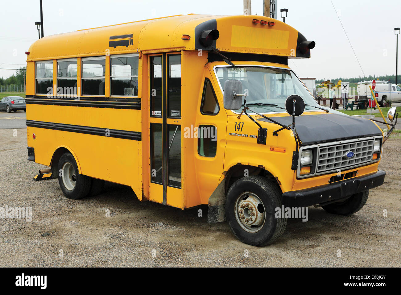 A yellow school bus in La Ronge, Saskatchewan, Canada. Stock Photo