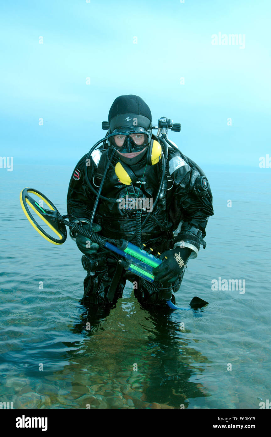 Diver with the metal detector searching for underwater treasure, lake Baikal, Siberia, Russia, Eurasia Stock Photo