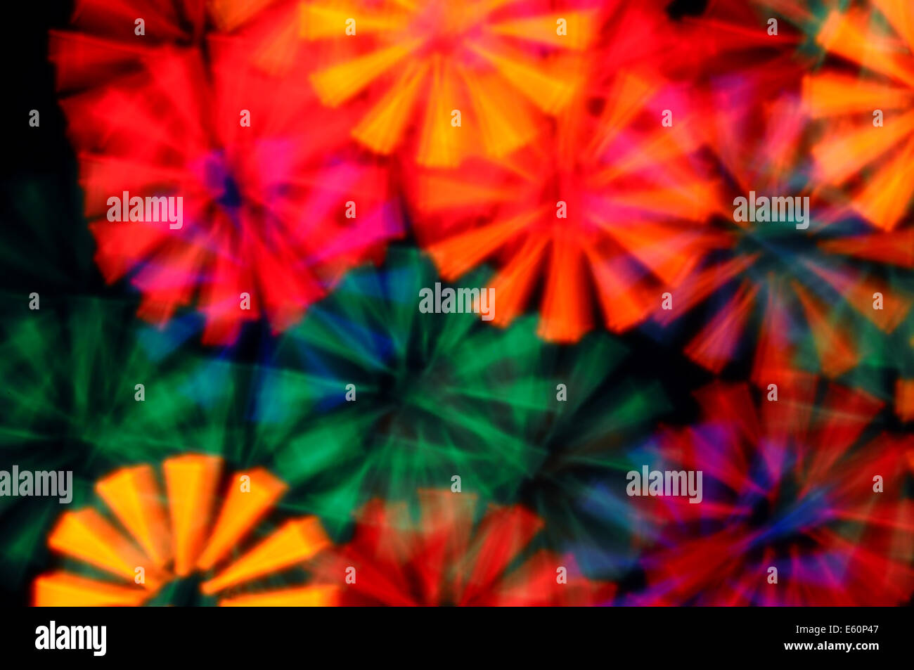 Colorful light rays abstract blurry circles psychedelic background. Stock Photo