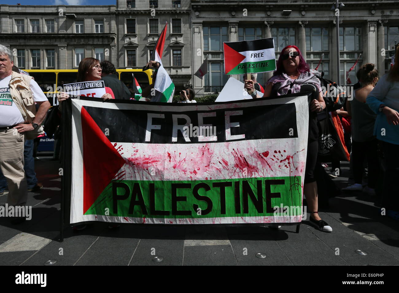 People with a 'Free Palestine' banner during the rally in Dublin city centre in solidarity with the people of Gaza, Palestine. Stock Photo