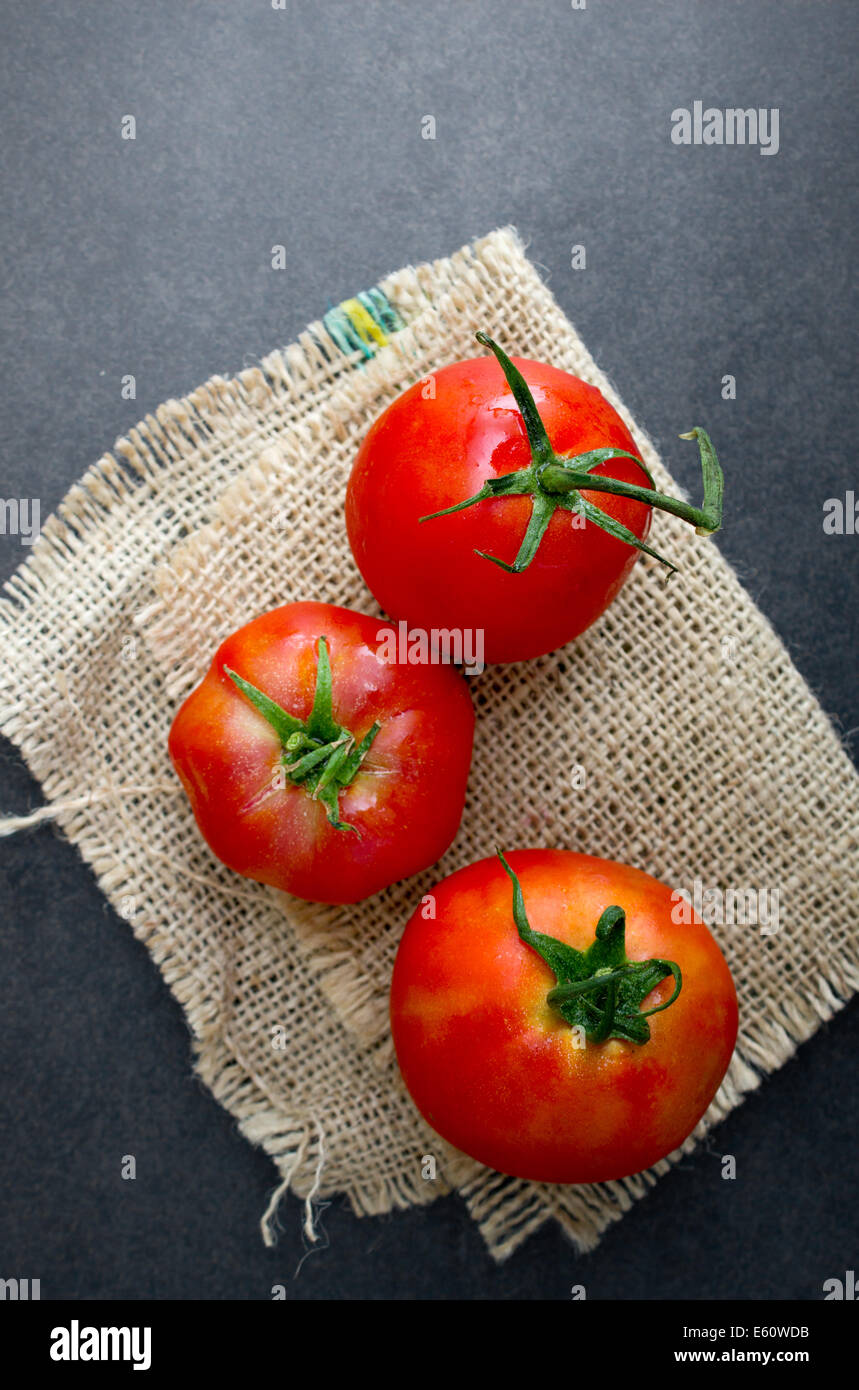 fresh organic tomato on table, from above Stock Photo