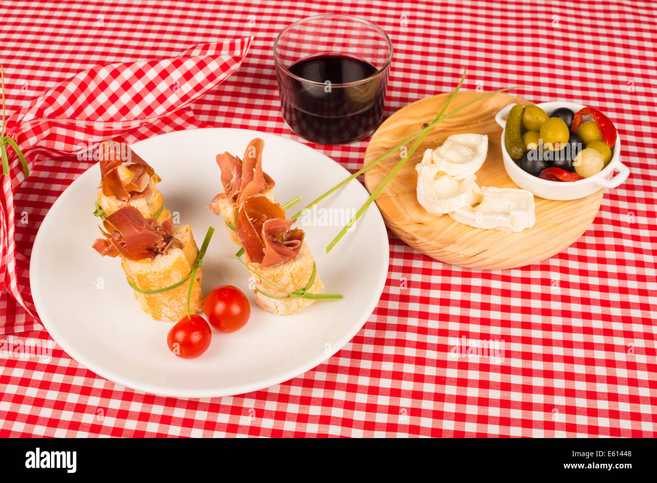 Serrano ham on bread, a traditional Spanish tapa Stock Photo - Alamy