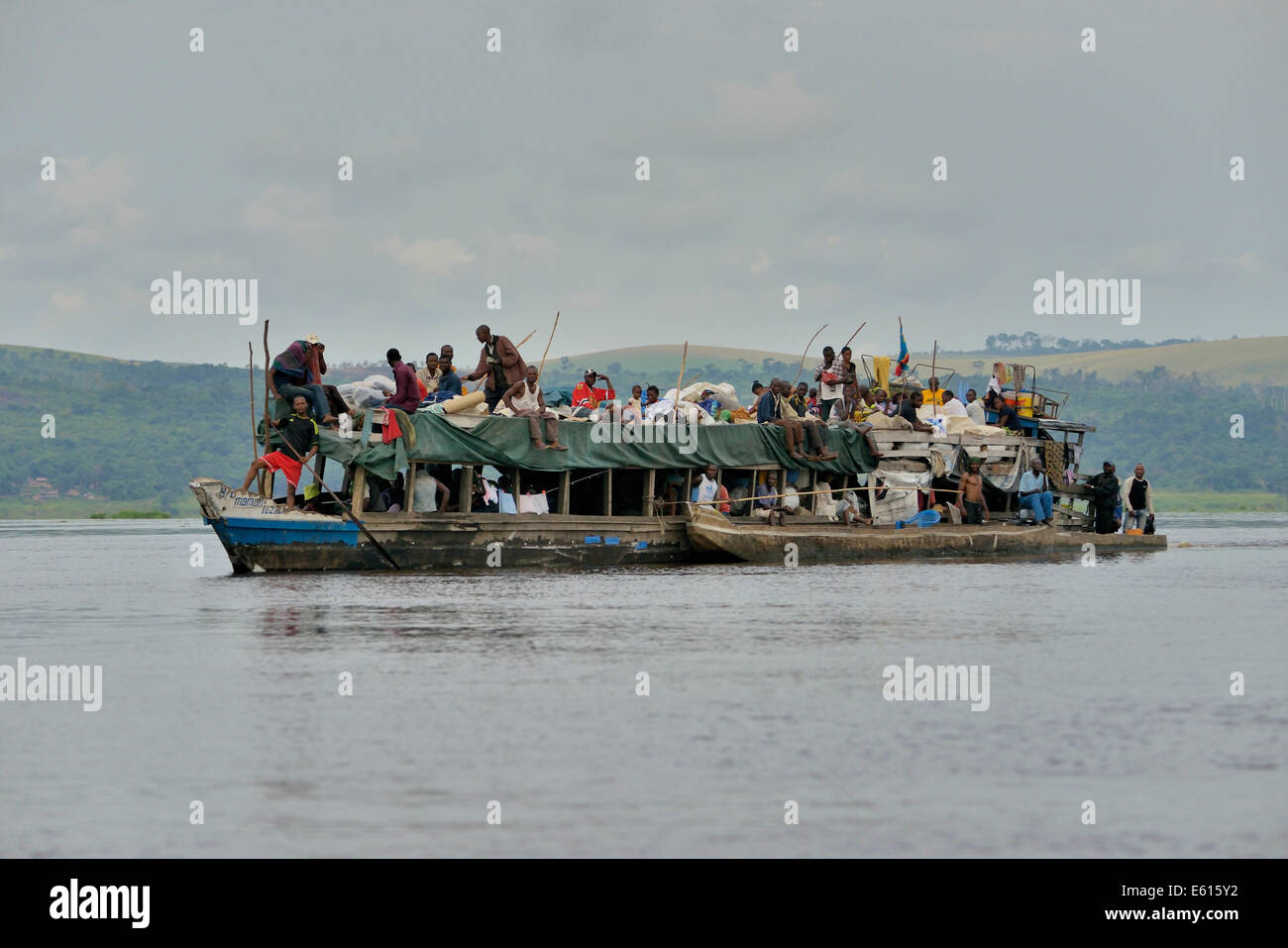 Overloaded boat on the Congo River, near Tshumbiri, Bandundu Province, Democratic Republic of the Congo Stock Photo