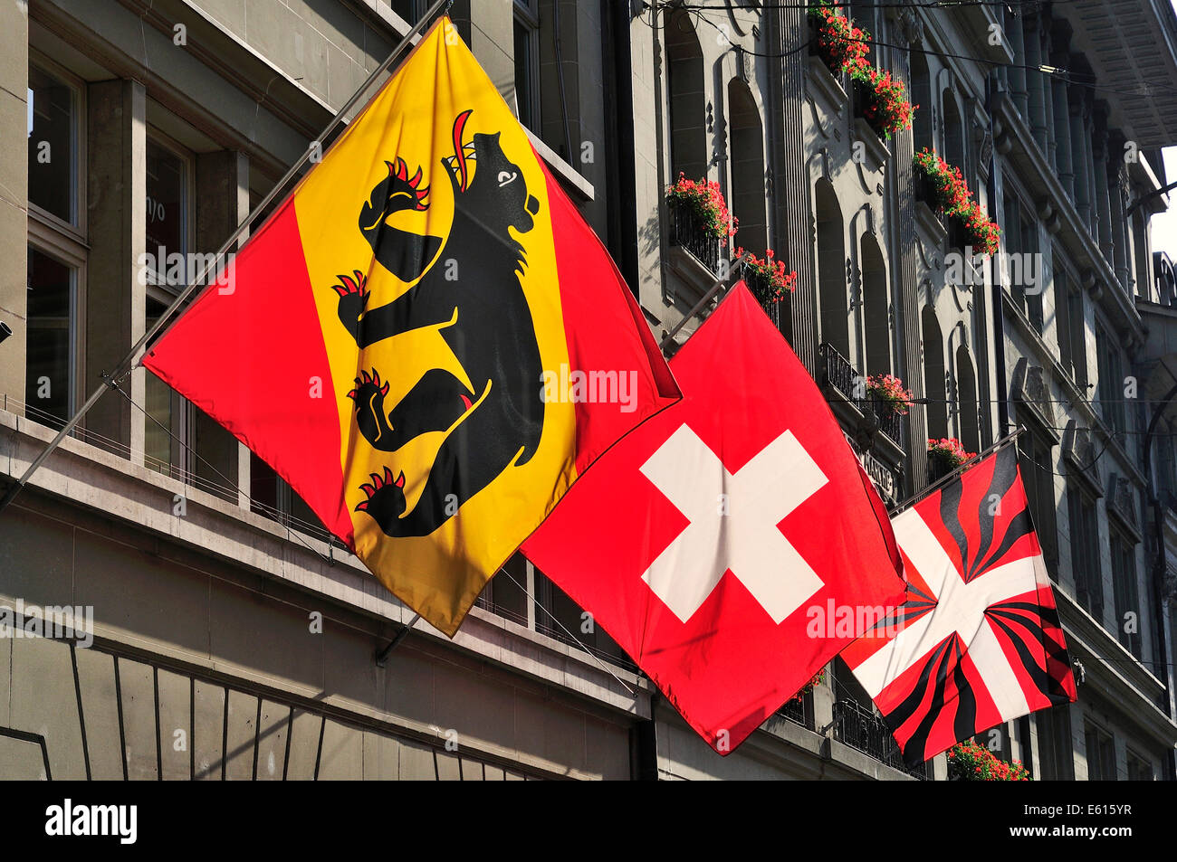 Flags of the Canton of Bern, Switzerland and Bern on a house, Bern