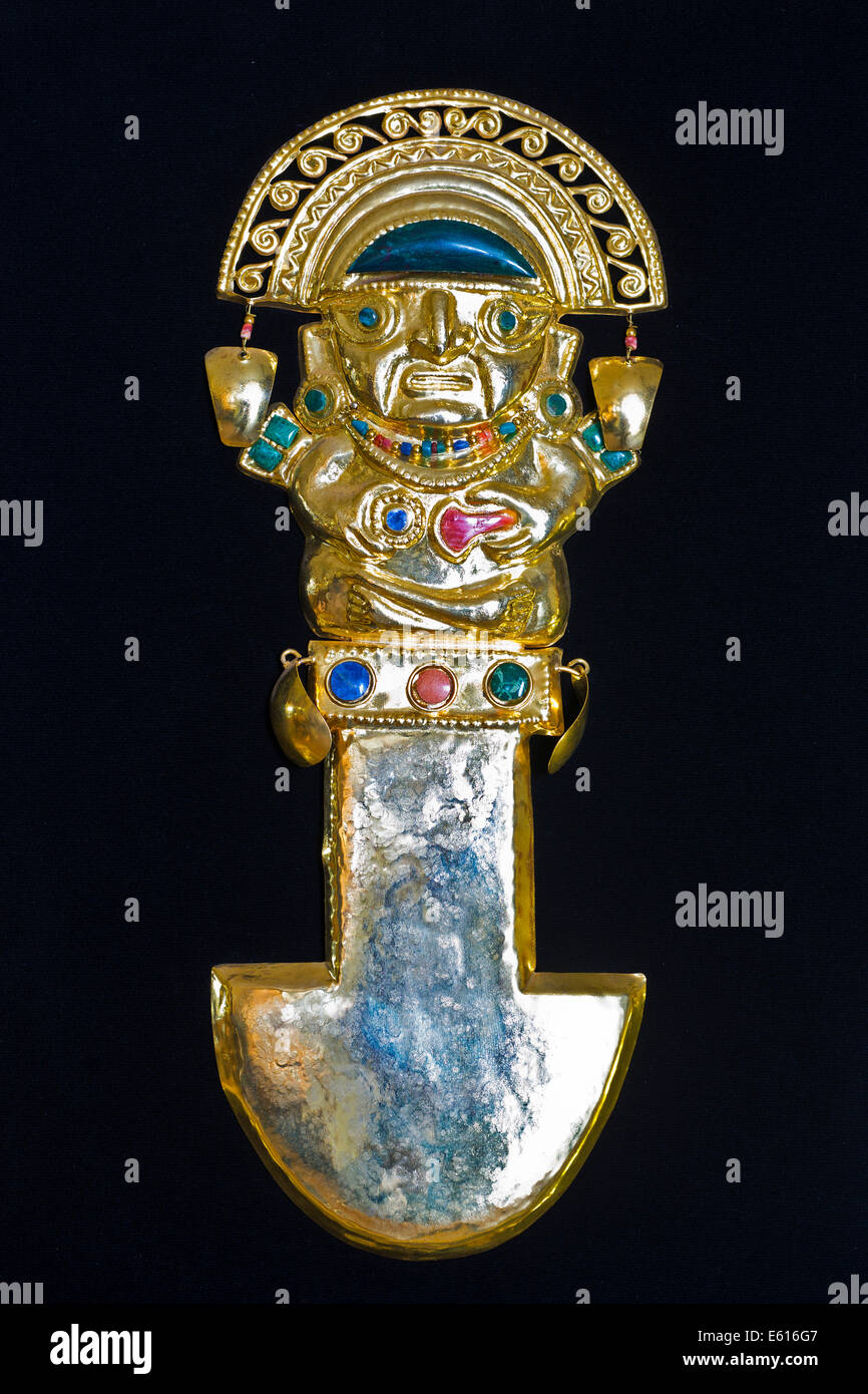 Golden pre-Columbian ritual knife or Tumi, replica, sheet brass with semi-precious stones, souvenir, Cusco, Peru Stock Photo