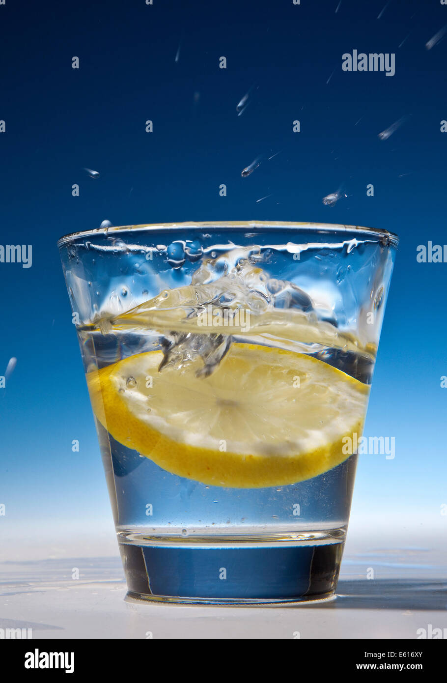 Slice of lemon in a glass of water Stock Photo Alamy