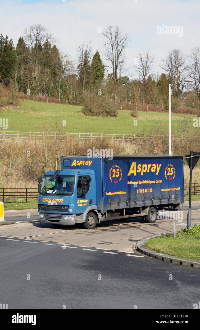 A Leyland Daf curtainsider entering a roundabout in Coulsdon, Surrey, England Stock Photo
