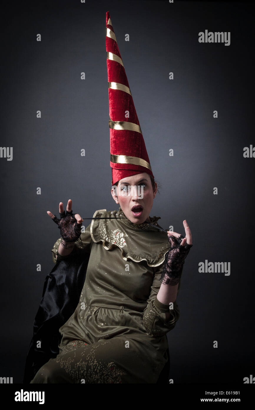crazy women with capirote (hat tip) Stock Photo