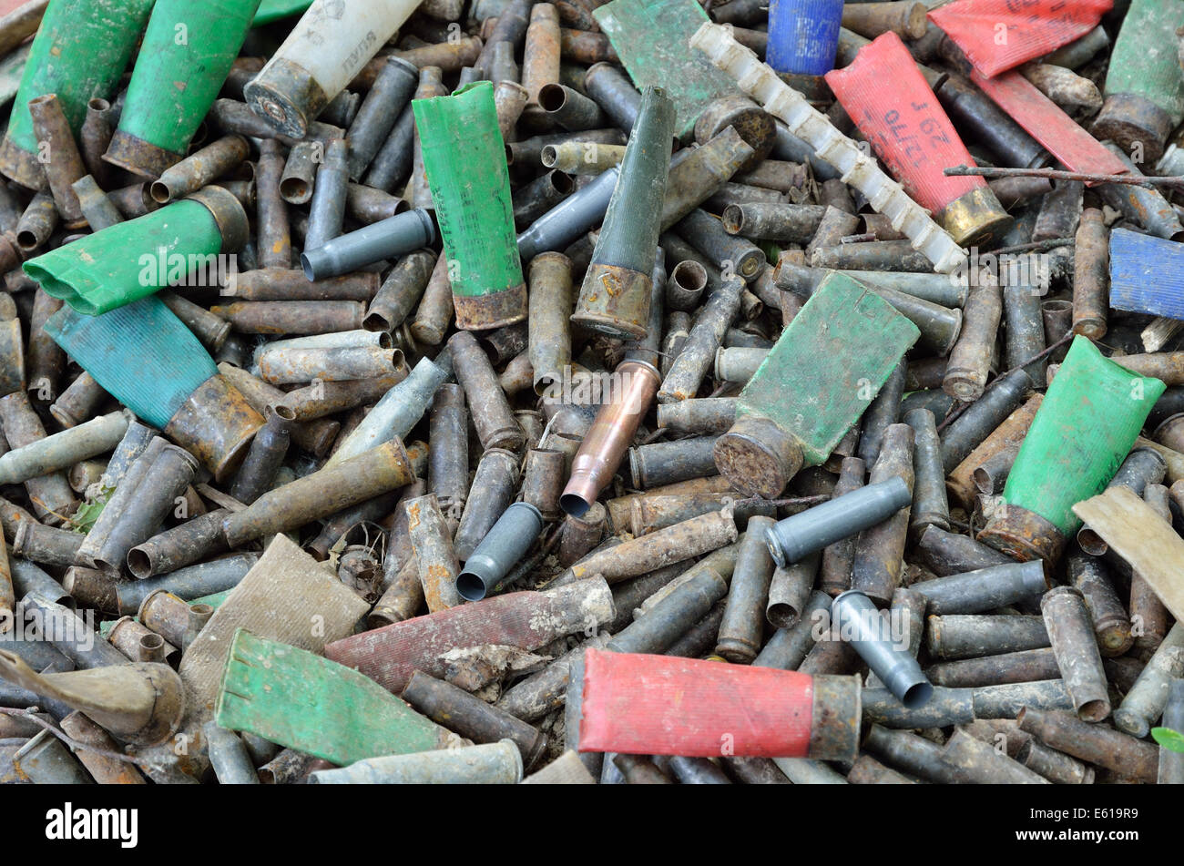 Military background of used shells Stock Photo - Alamy