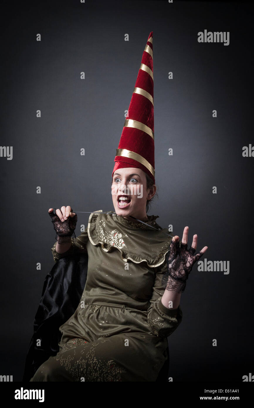 crazy women with capirote (hat tip) Stock Photo