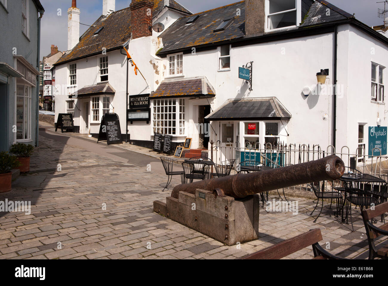 UK England, Dorset, Lyme Regis. Broad Street, seafront cannon Stock Photo