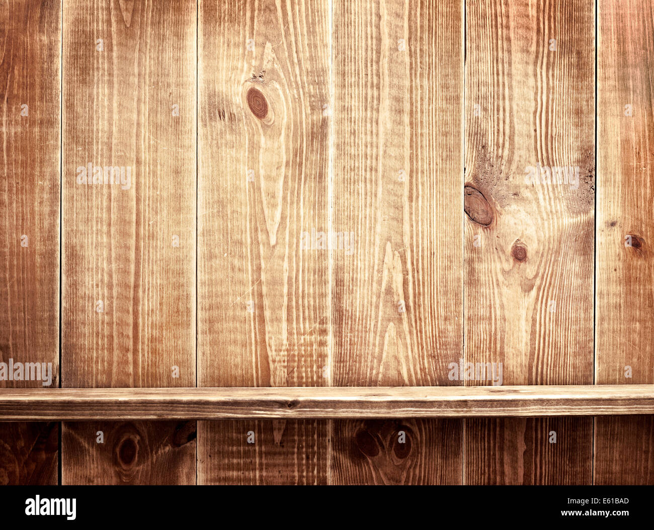 Empty shelf on wooden background. Wood texture. Stock Photo