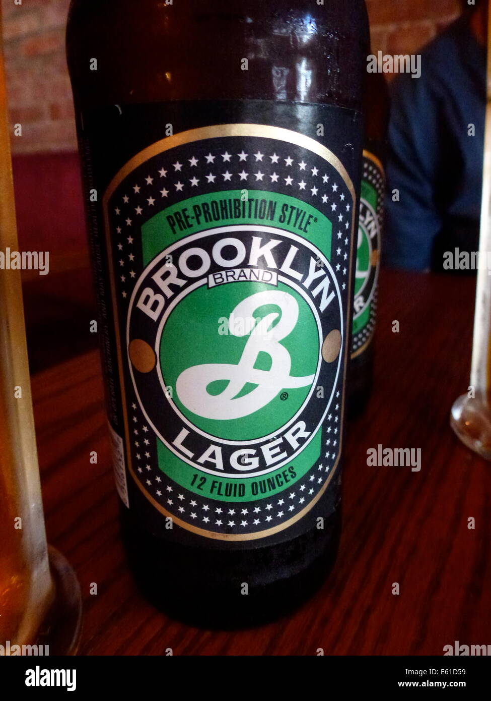 A beer bottle with Brooklyn Lager Beer of the Brooklyn Brewery in New York, USA, 24 June 2014. The logo of the brewery was designed by Milton Glaser, who also designed the 'I love NY' logo. Photo: Alexandra Schuler/dpa - ATTENTION! NO WIRE SERVICE - Stock Photo