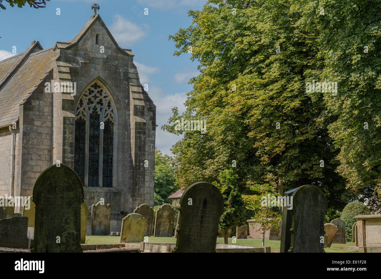Church and graveyard in Little Driffield, East Yorkshire, England Stock Photo