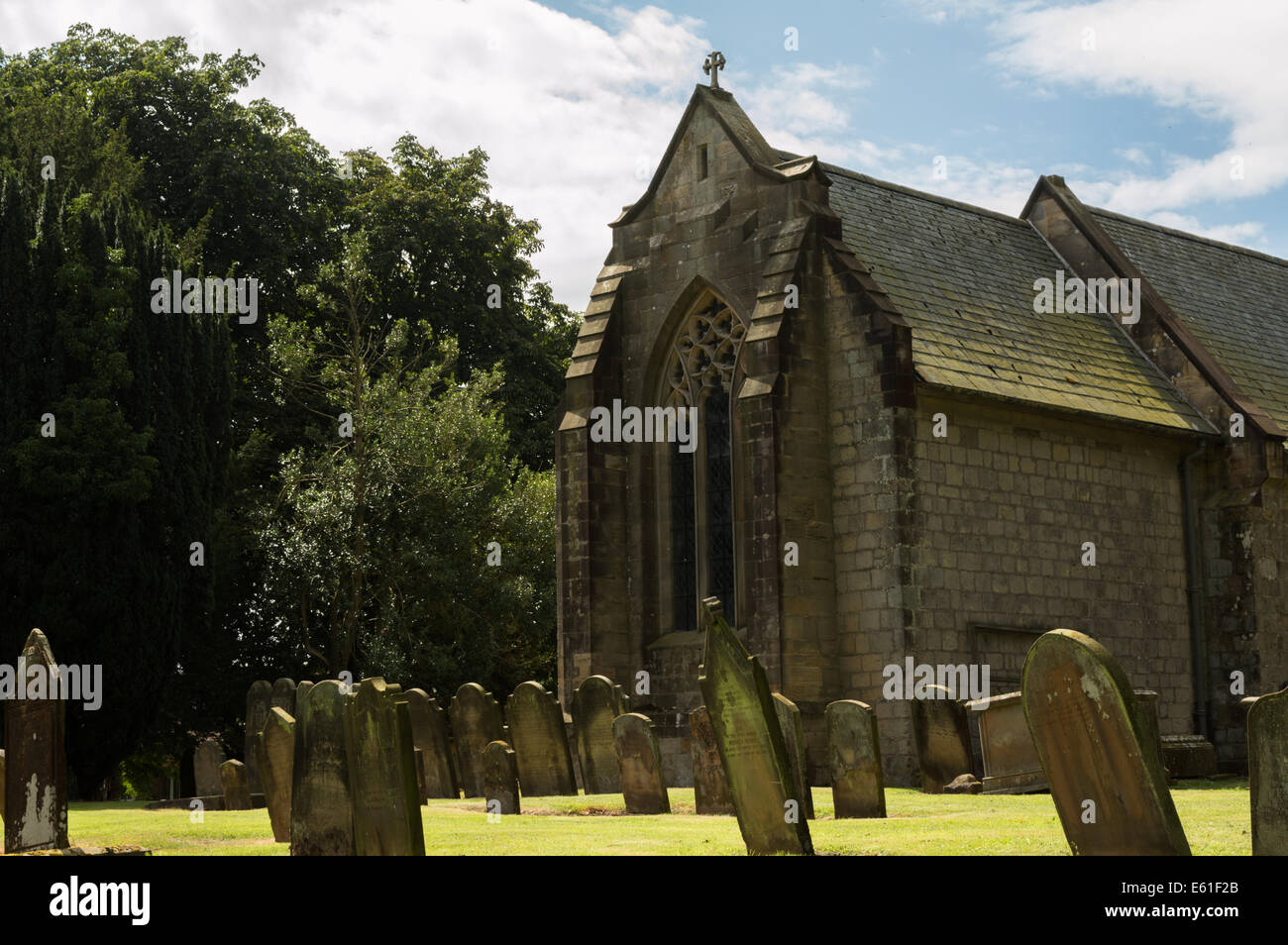 Church and Graveyard in Little Driffield, East Yorkshire, England Stock Photo